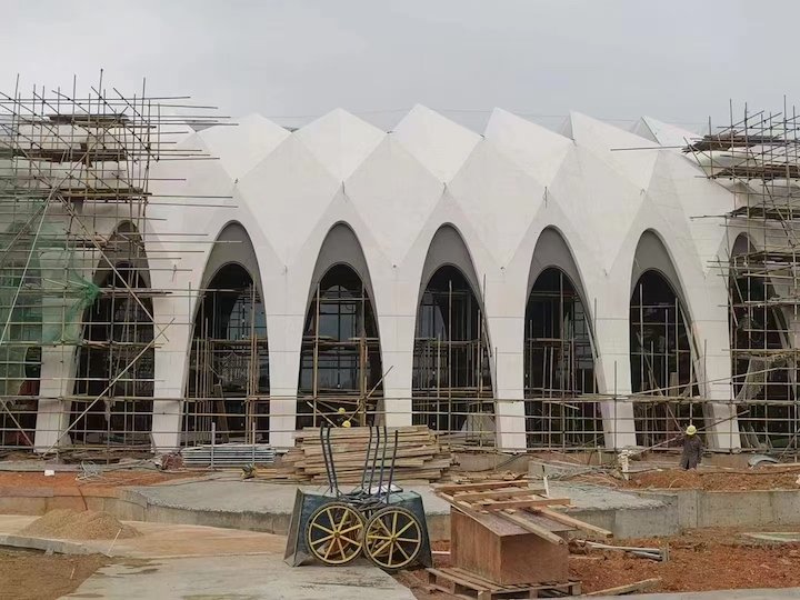 large limestone panels installed on ventilated facade cladding system